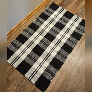 Black and white buffalo check rug